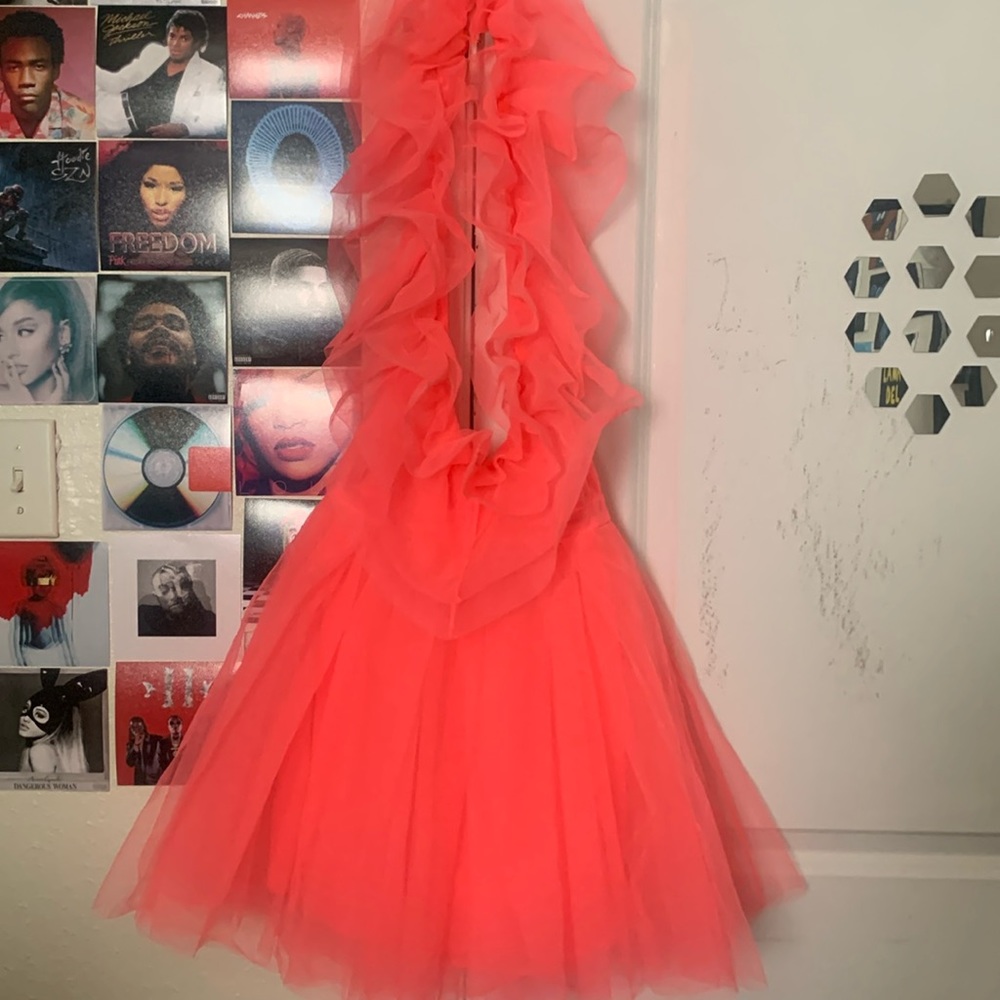 This is a hot pink dress from Fashion Nova.